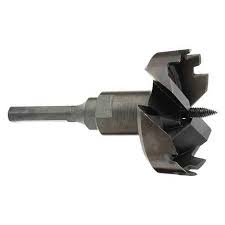 What are the common challenges that drill bits face when drilling for water wells?