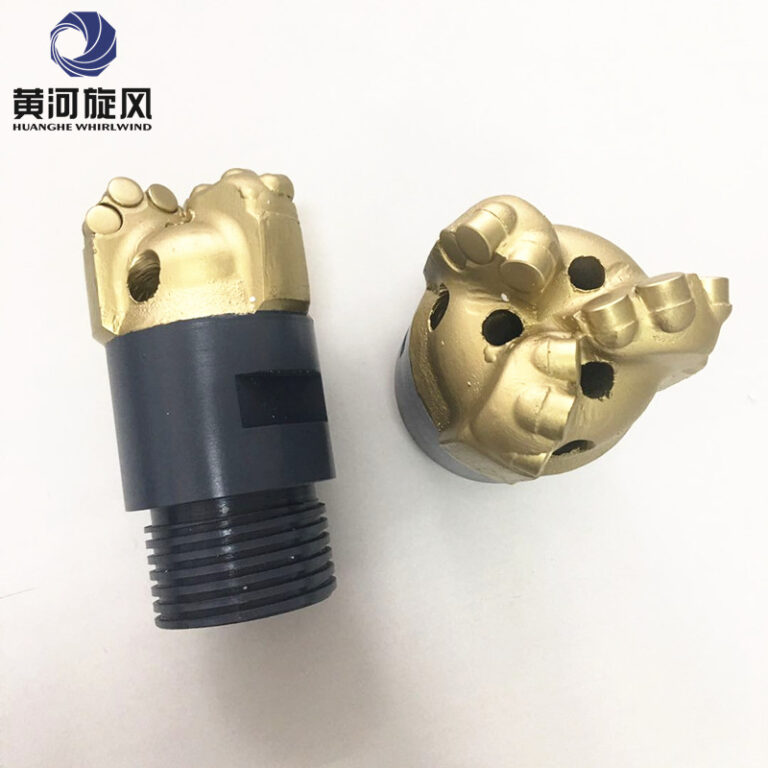 What materials are commonly used to manufacture drill bits for water well drilling?
