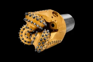 What are the different materials used to manufacture drill bits for coal mining?