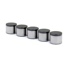 What are the key design features of PDC cutters that make them effective for cutting and shaping stone?